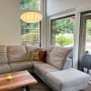 Steinhauer Sparkled Light verstellbare Bogenstehlampe, dimmbar, mit weißem Stoffschirm
