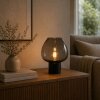 Brilliant Tischleuchte Ligari mit bauchigem, tropfenförmigem rauchfarbenem Glasschirm
